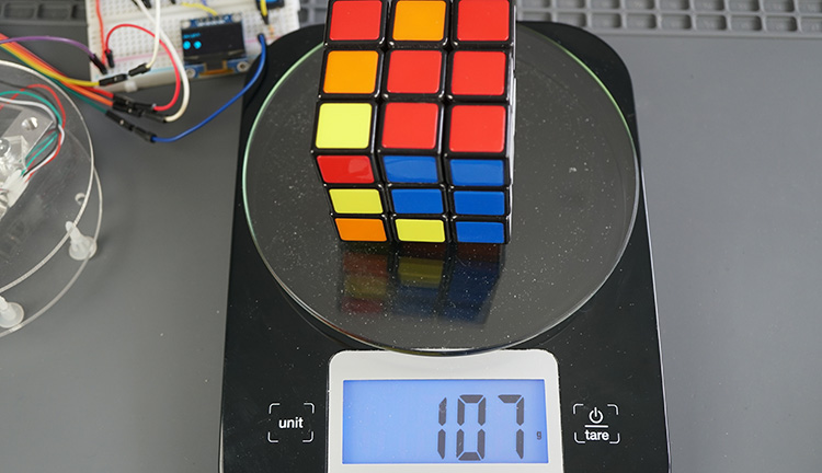 ESP32 digital scale demonstration OLED display weight comparison